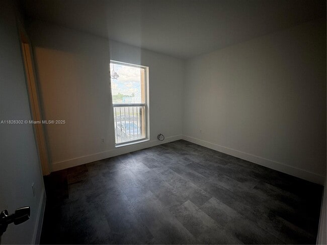 Building Photo - 241 S Royal Poinciana Blvd