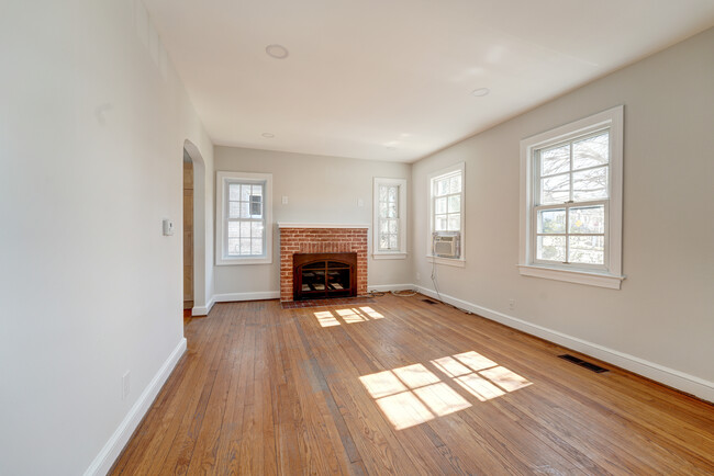 Huge Living Room boasts wood-burning fireplace! - 4607 N Carlin Springs Rd