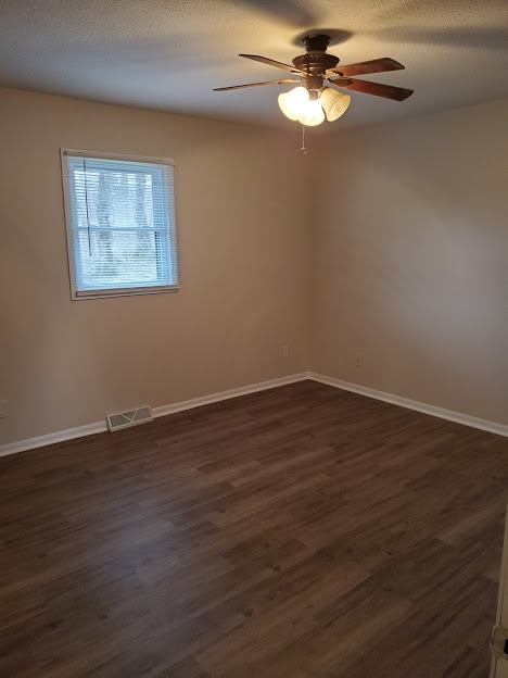 Master bedroom with ceiling fan, backing to a wooded area. Nice and peaceful. - 4460 Santa Barbara