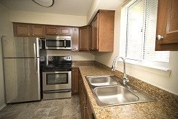 Building Photo - Whispering Winds Apartments