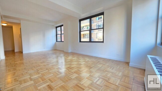 Building Photo - Sunlit 11th-Floor Corner 1-Bed with Skyline Views in Turtle Bay
