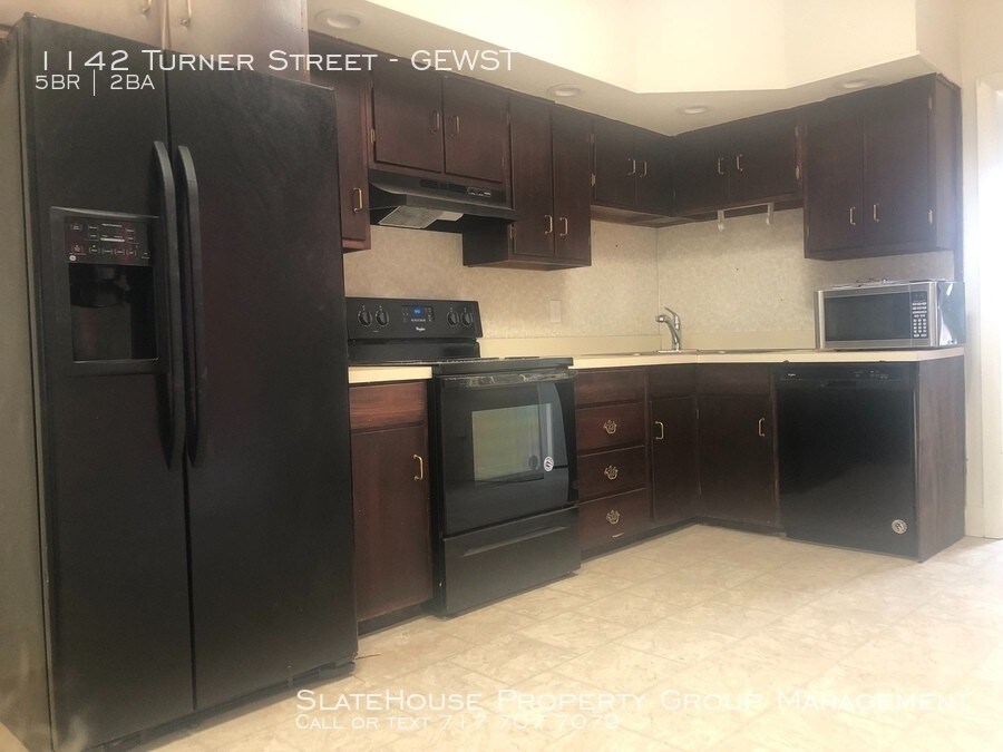 FIVE BEDROOM/1-1/2 BATH all brick TOWN HOME