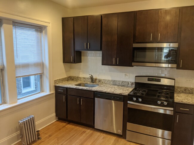 Foto del edificio - 6441 N Newgard Ave