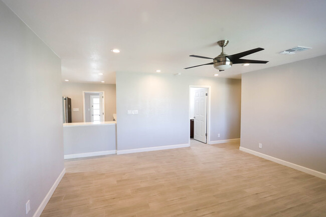 Entertain in the open floorplan with hardwood floors! - 12224 N 23rd St