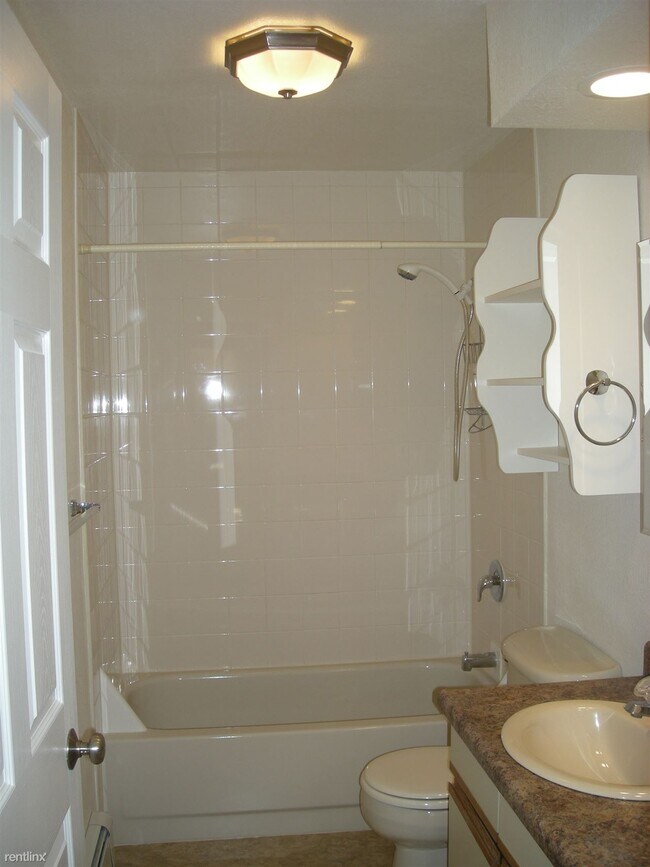 Building Photo - 2 br, 1 bath 4plex - 712 W 47th Ave Apt 3 #3
