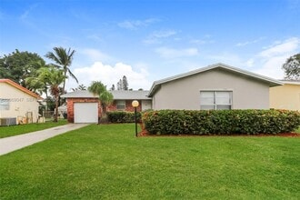 Building Photo - 9749 Sandalfoot Blvd