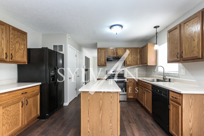 Foto del edificio - The living is easy in this lovely 3 bedroo...