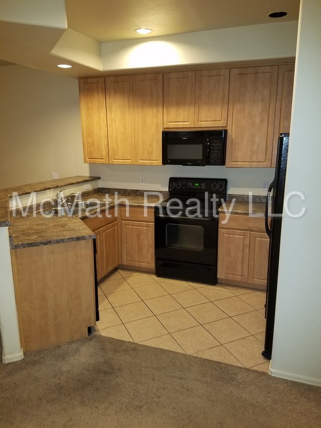 Building Photo - CONDO WITH TWO MASTER BEDROOMS FOR LEASE