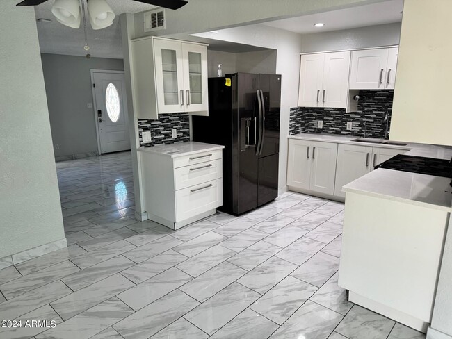 Building Photo - 7209 W Luke Ave