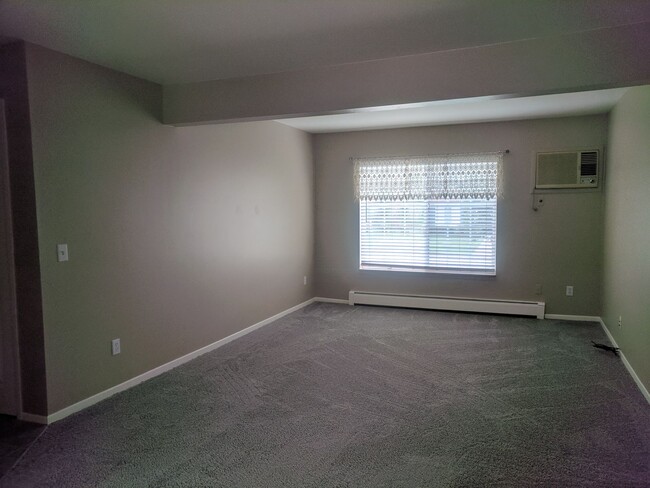 Building Photo - Charming 2-Bedroom Condo – $1,150/month In...