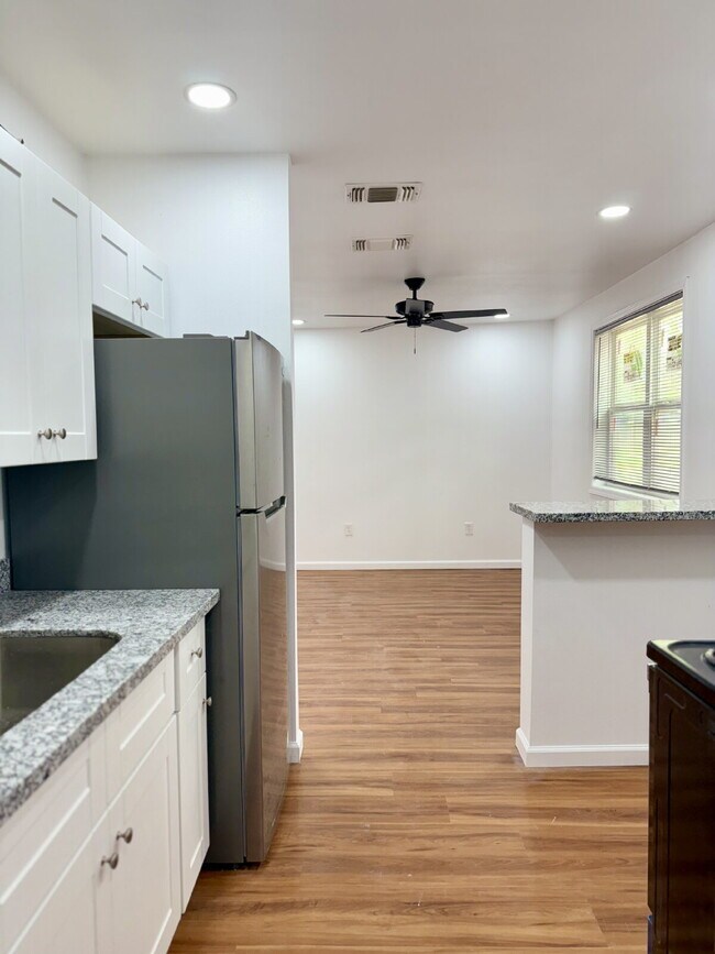 Building Photo - Unbeatable Location: Modern Living Steps f...