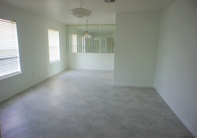 Living and Formal Dining room - 14910 Scotter Dr