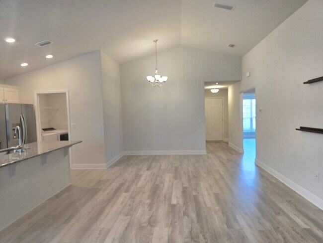 Building Photo - Bright, Open Layout | Screened Porch + Paver Patio | Move-In Ready