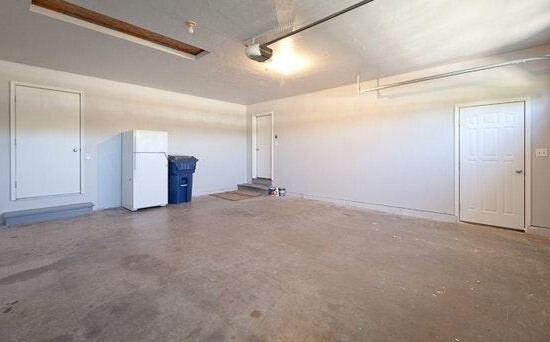 Insulated garage with additional storage - 2934 Popplewood Ct