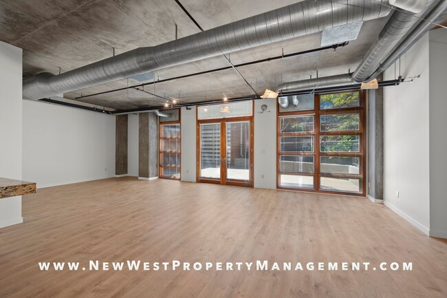 Building Photo - Expansive East Village loft at Parkloft, a...