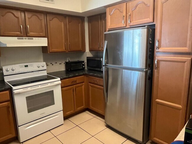 Building Photo - 10371 SW 150th Pl