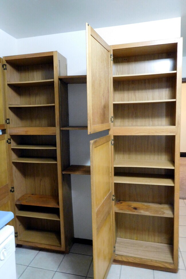 Pantry cabinets open - 703 W Pecan St