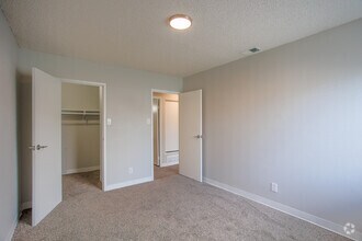 River Platinum - Primary Bedroom - Valley Apartments