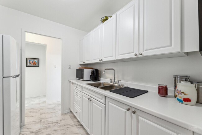 Photo du bâtiment - Wellington Suites