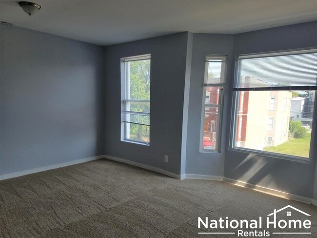 Building Photo - 4334 S Langley Ave Unit 2