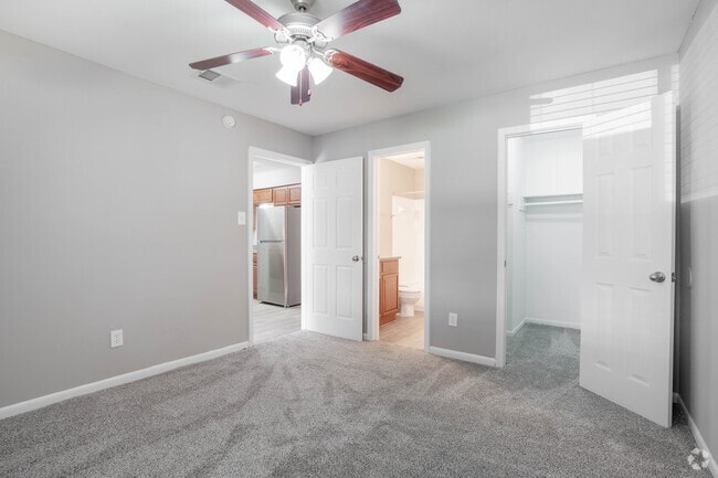 3BR, 2BA - 1052SF - Primary Bedroom - Lake Houston Pines