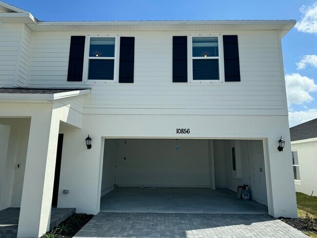 Building Photo - 10856 NW Everbreeze Dr