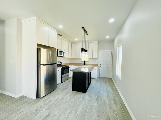 Building Photo - 1301 S Xanthia St