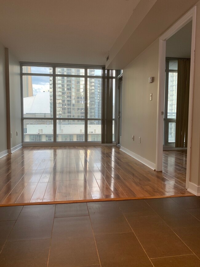 Living room facing Rogers Center and CN Tower - 15 Fort York Blvd
