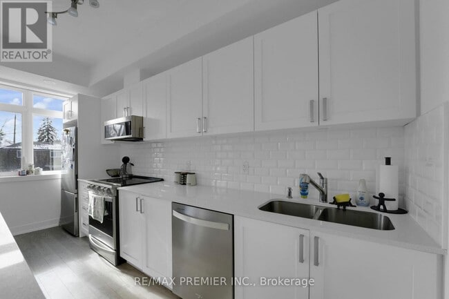 Building Photo - 1115 Douglas McCurdy Cmn