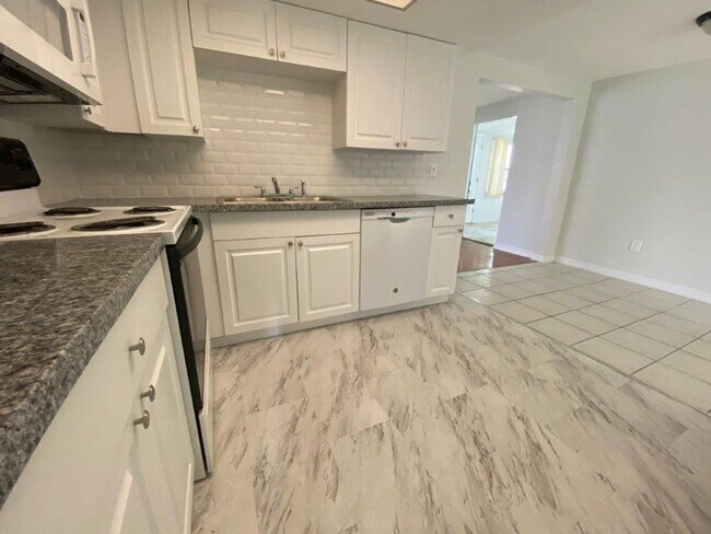 Building Photo - 12903 College Hill Dr