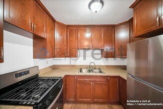 Building Photo - 2458 Normandie Ave