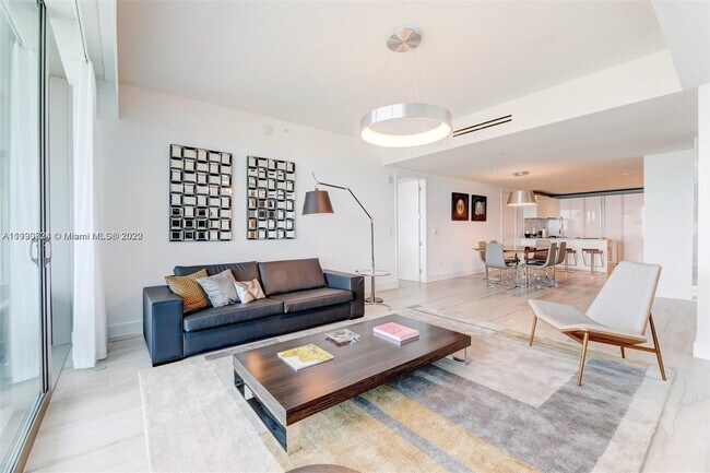 Building Photo - 10203 Collins Ave