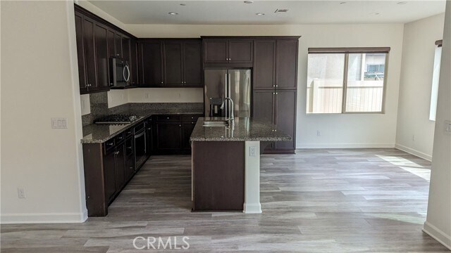 Foto del edificio - 15807 Moonflower Ave