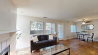 Located at 300 Cirby Hills Dr in Roseville, CA, this single-floor, 2-bedroom, 3-bathroom residence offers a well-organized and functional layout. Rich wood-look flooring flows throughout the main living areas, creating a warm and cohesive aesthetic.

The living room serves as the heart of the home, highlighted by a tile-surround fireplace and vertical blinds that allow natural light to filter in. Adjacent to it, the dining area features the same warm flooring, a ceiling fan, and a window that brightens the space. The galley-style kitchen is efficiently designed with white cabinetry, white countertops, and black appliances including a gas range, dishwasher, microwave, and refrigerator.

The primary bedroom is a comfortable retreat with plush carpeting, a ceiling fan, and a window with exterior views. The second bedroom mirrors this setup with soft carpet, a ceiling fan, and natural light. Three bathrooms serve the home — including one with a sliding glass-door shower and another with a full tub/shower combo, both finished with wood-look flooring and clean white fixtures.

A bright entryway with wood-look flooring and multiple windows provides a welcoming arrival point. Ceiling fans throughout the home contribute to year-round comfort, making this a practical and well-appointed residence.