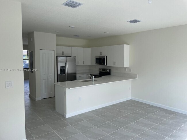 Building Photo - 11407 W 34th Ct