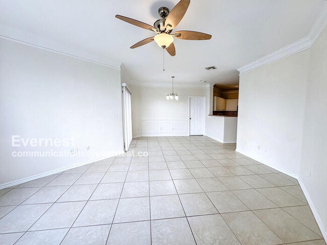 Building Photo - Lovely 2BR Third-Floor Condo in Gated Comm...