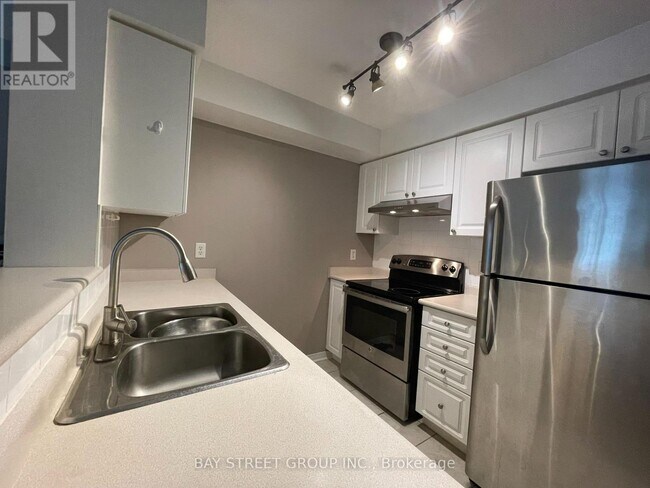 Photo du bâtiment - 906-920 OLIVE Ave