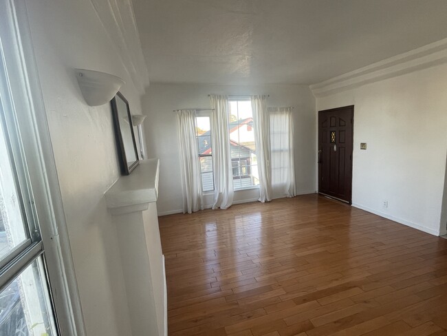 Spacious and sunny living room. - 2817 S Sycamore Ave