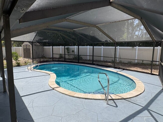 Building Photo - Stunning Custom Pool Home with Luxury Finishes!