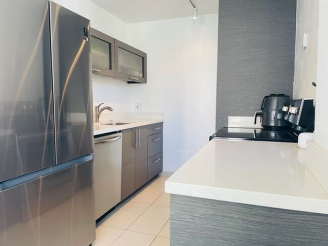 Building Photo - FURNISHED 1 Bedroom, 1 Bathroom, 1 Parking...