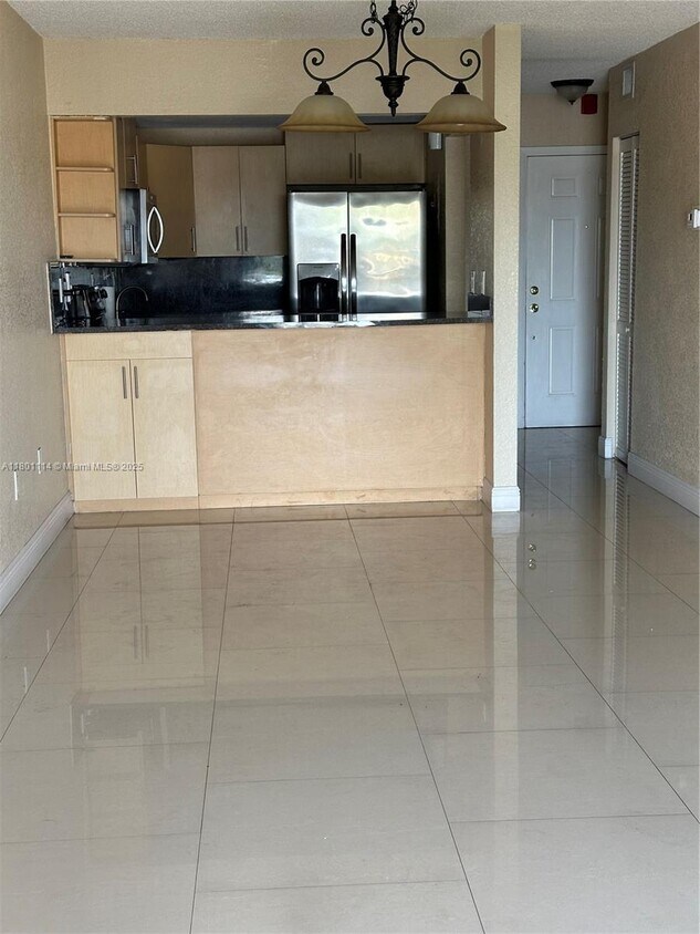 Foto principal - 6095 W 19th Ave