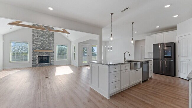 Building Photo - "Lovely 4-Bedroom Retreat with Fireplace &...