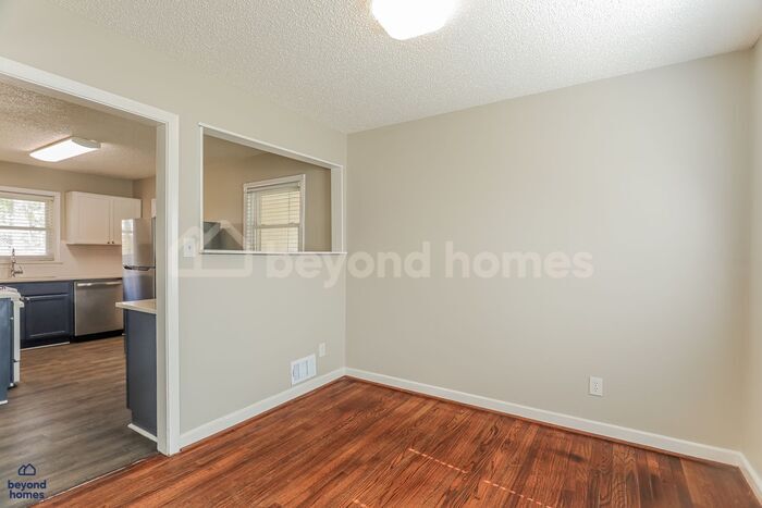 Building Photo - Professionally Renovated Brick Ranch with Designer Kitchen - Ready to Move-In!