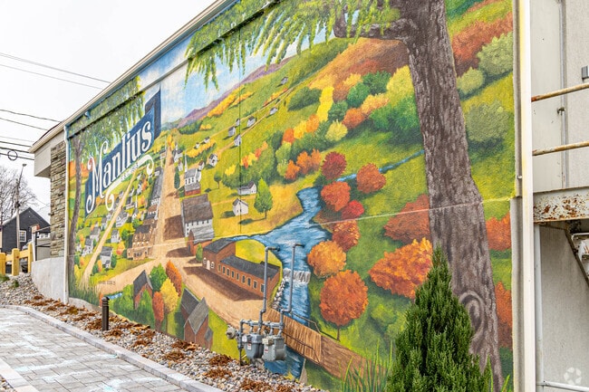 You can find many art murals throughout the town of Manilus.