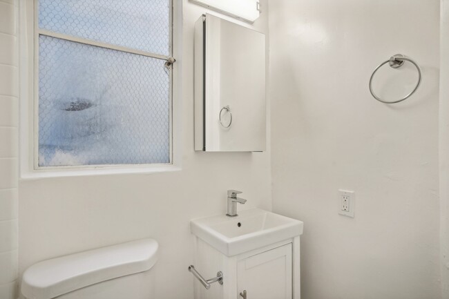 Bathroom with toilet and sink - 2605 Haste Street