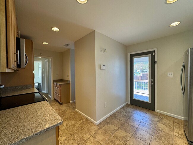 Building Photo - Welcome to this charming bungalow-style ho...