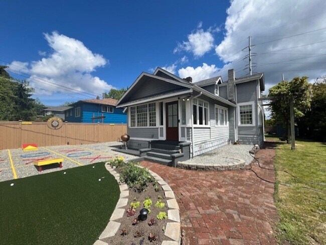 Building Photo - Classic Greenwood Home with Unique Outdoor...