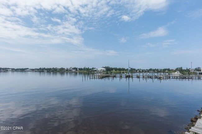 Building Photo - Enjoy this view from your balcony at  Bayou Pointe Villas
