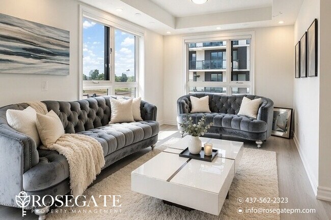 Photo du bâtiment - Spacious Corner Condo-Townhouse with Wraparound Balcony & Garage – Oakville