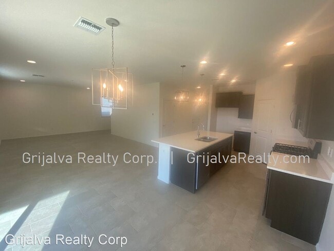Building Photo - 4 br, 3 bath House - 10677 W Harrigan Drive